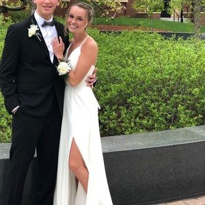 Faviana low V-neck, corset back ivory prom dress